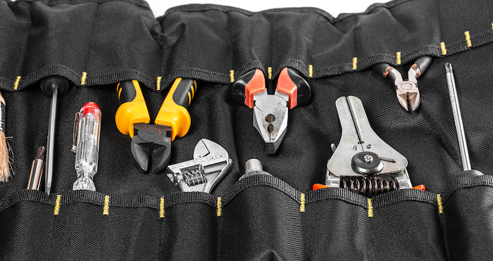 A bunch of tools in a rolling tool pack.